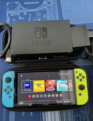Switch oled pucée 128go - pucée, très